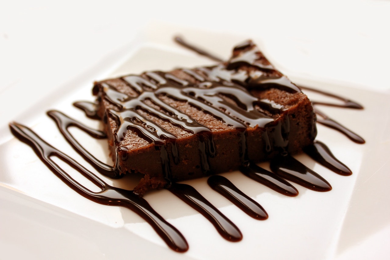 Fudge brownie on white plate