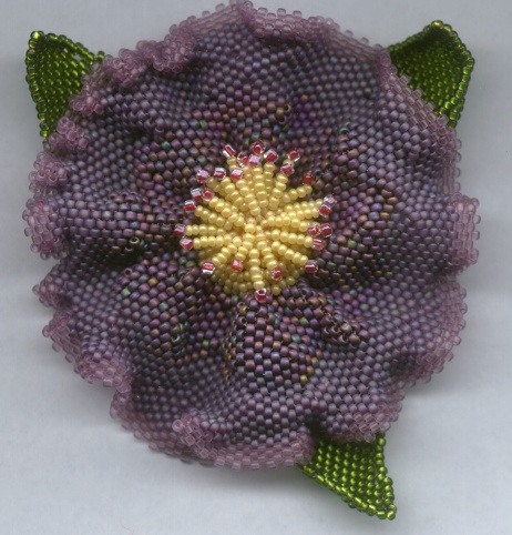 purple beaded flower by Lynn Smythe