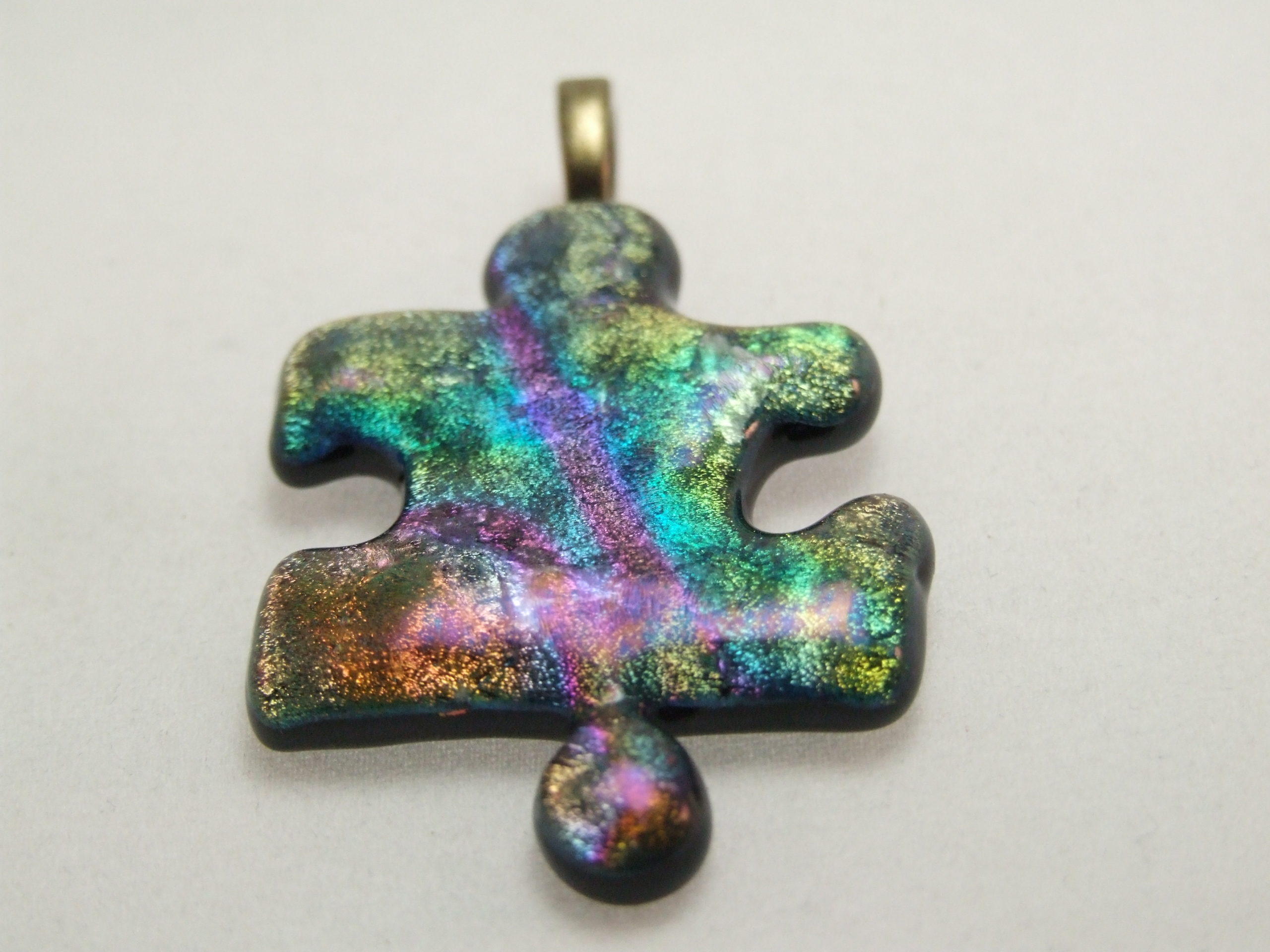 Fused glass puzzle pendant by Lynn Smythe