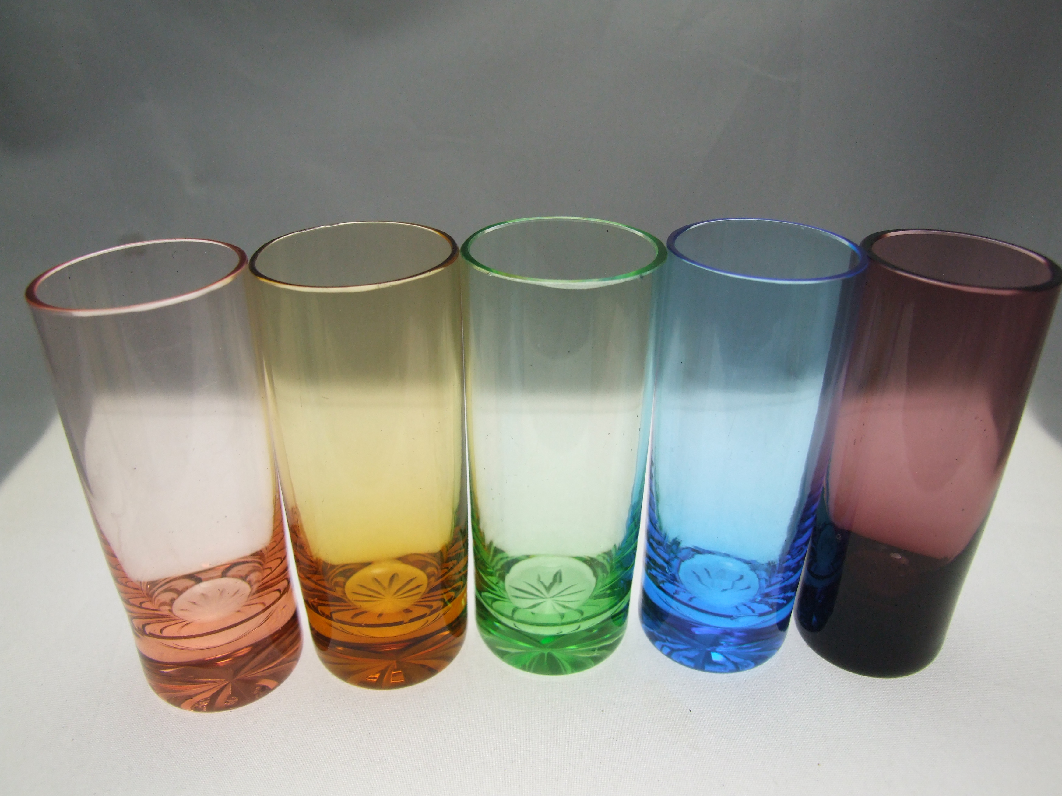 Retro rainbow colored shot glass set.