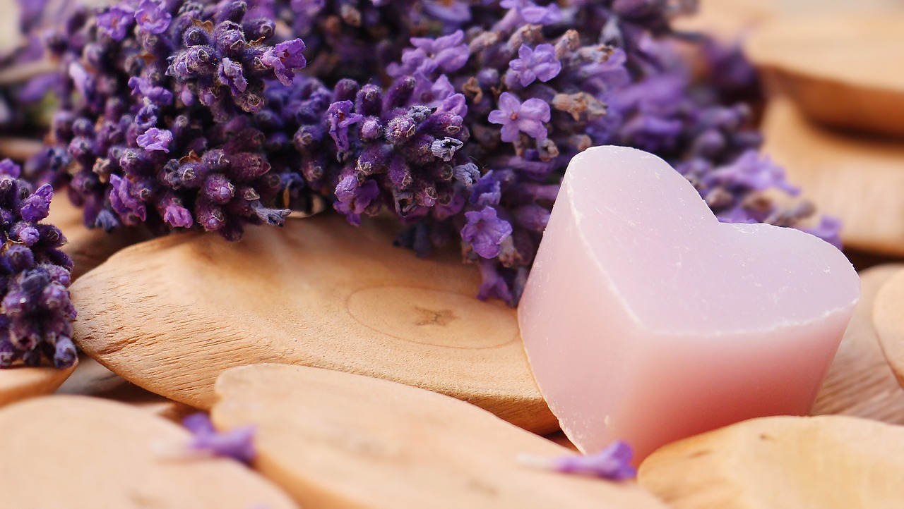 Lavender flowers and lavender soap on wood blocks