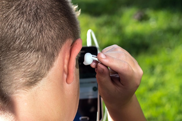 Boy headphones hearing aid.
