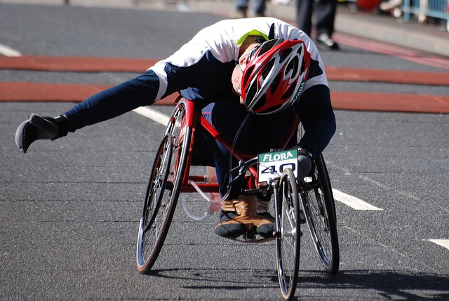 Man in wheelchair racing