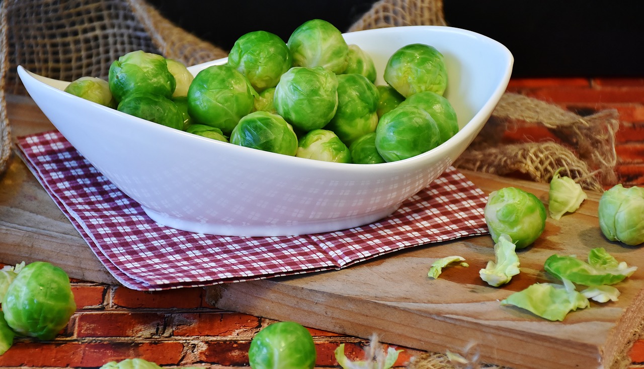 brussels sprouts in white casserole dish