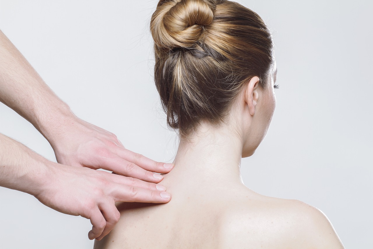 young girl getting back massage