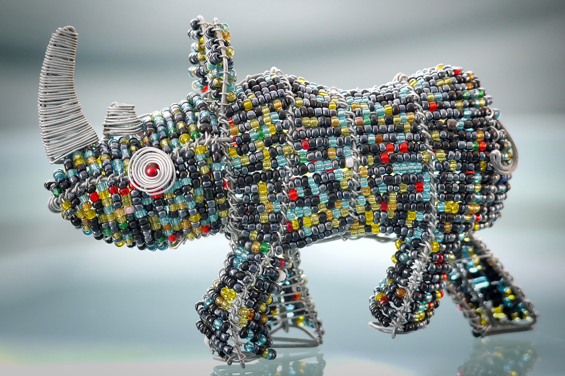 Rhinoceros-themed beaded artwork